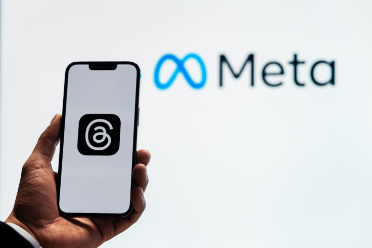 Holding a Smartphone with the Threads App with the Meta