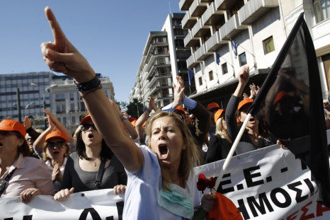 A woman shouts while taking part in an anti-austerity rally in Athens' Syntagma square