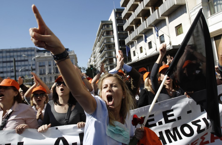 A woman shouts while taking part in an anti-austerity rally in Athens' Syntagma square