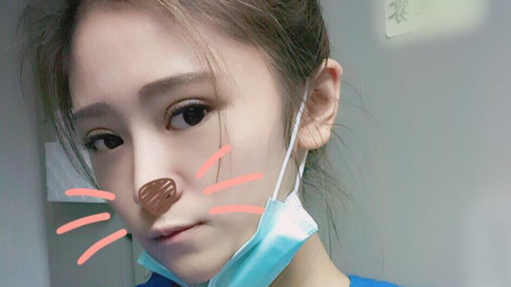 Iris in a nurse uniform