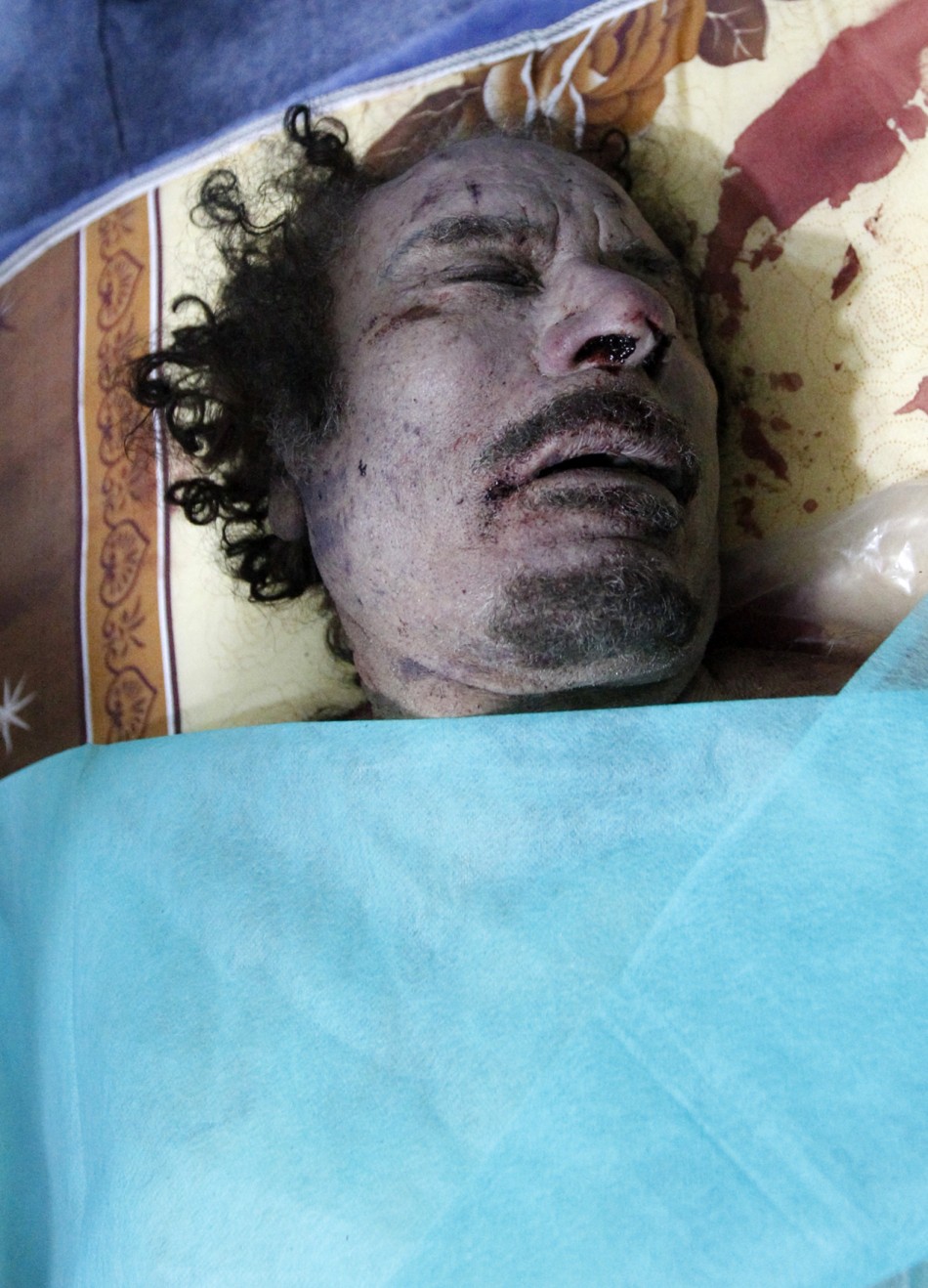 Muammar Gaddafi Killed Dead Body Photos Released