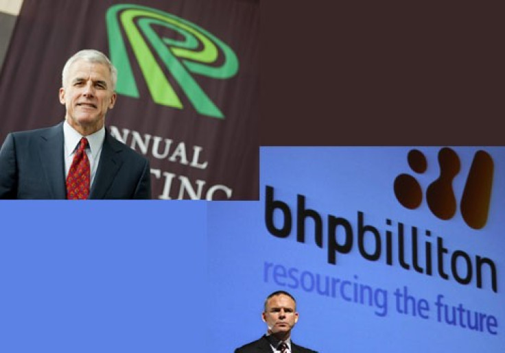 Potash Corp CEO Bill Doyle and (bottom) and BHP Billiton CEO Marius Kloppers