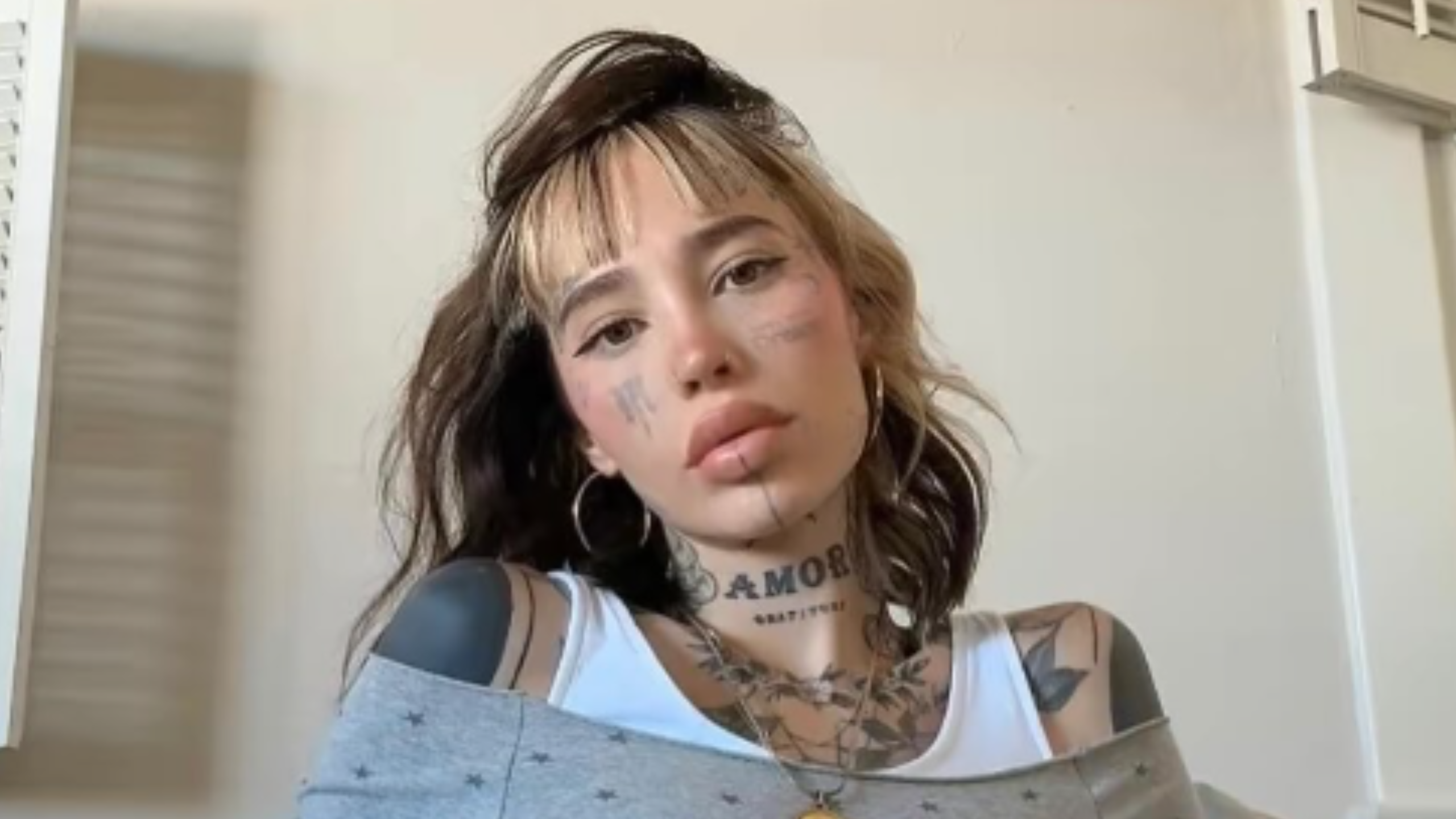 Face-Tattooed Colombian Woman Sparks Outrage After Pledging Allegiance to Colombia Despite U.S. Citizenship