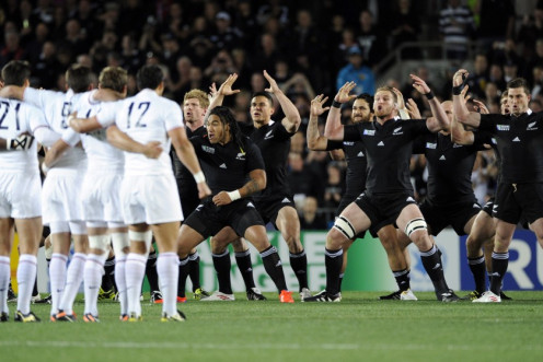France players look on as New Zealand All Blacks&#039; Kahui perform the Haka before their Rugby World Cup final match at Eden Park in Auckland.