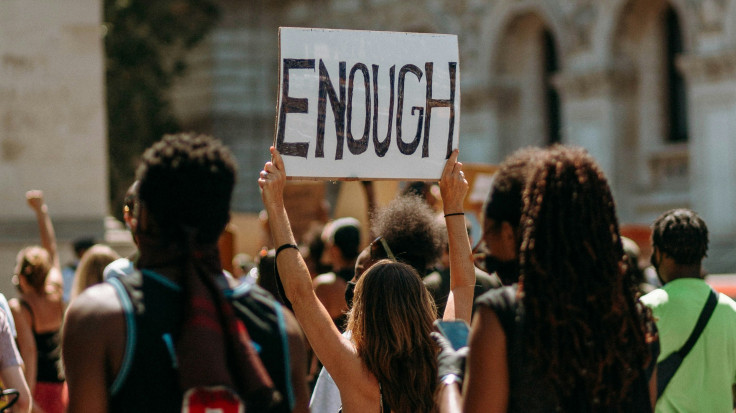 An Activist was arrested Mid-interview speaking against Trump on Venezuela