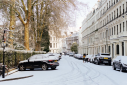 London Street covered with snow on sunny day