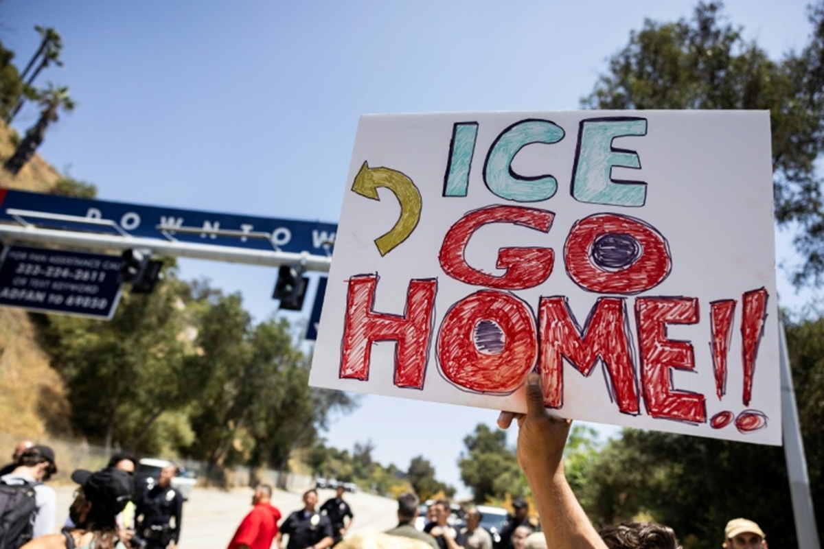 ICE Go Home sign
