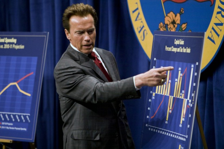 California Governor Arnold Schwarzenegger points at a graph as he proposes his $83.4 billion state budget plan.
