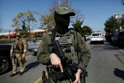 Masked ICE agent in Chicago