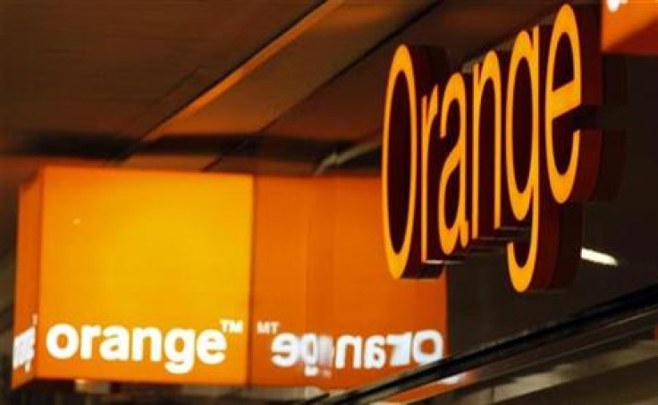 Logos of Orange are seen in front of an Orange France Telecom shop in Nice