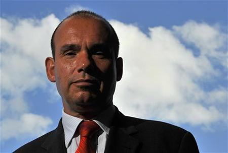 Former CEO of Olympus Michael Woodford poses for a photograph in central London