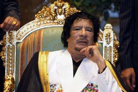 Libyan leader Gaddafi attends a gala dinner on the occasion of the 41st anniversary of the Libyan revolution in Tripoli