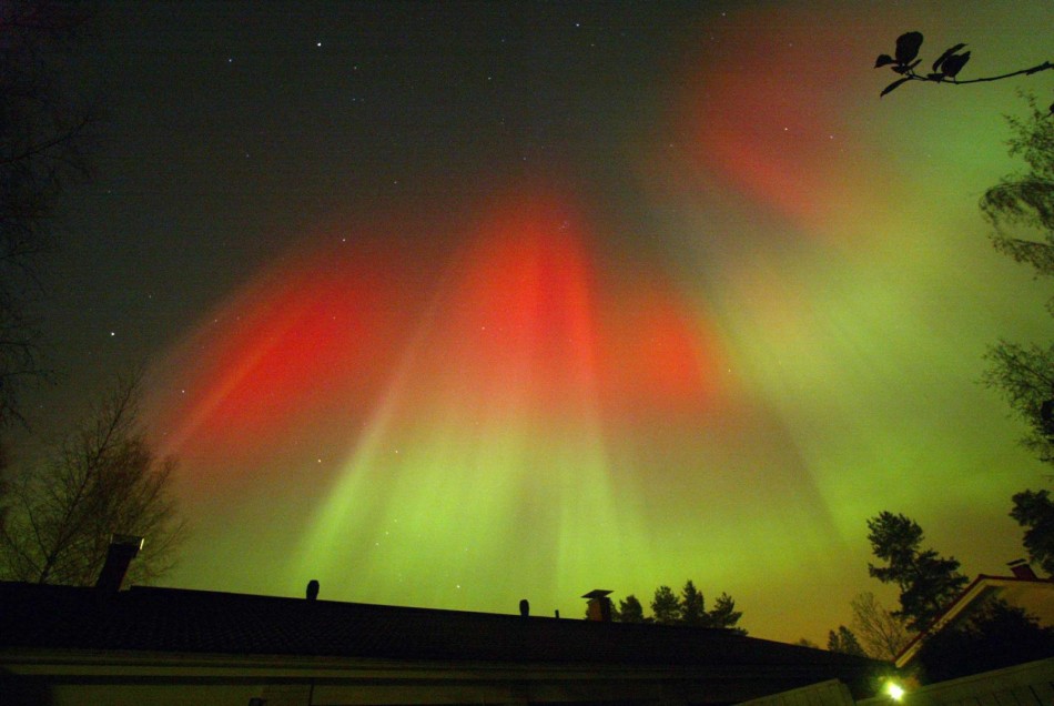 The Aurora Borealis is seen over the town of Hyvinkaa in southern Finland October 31, 2003.