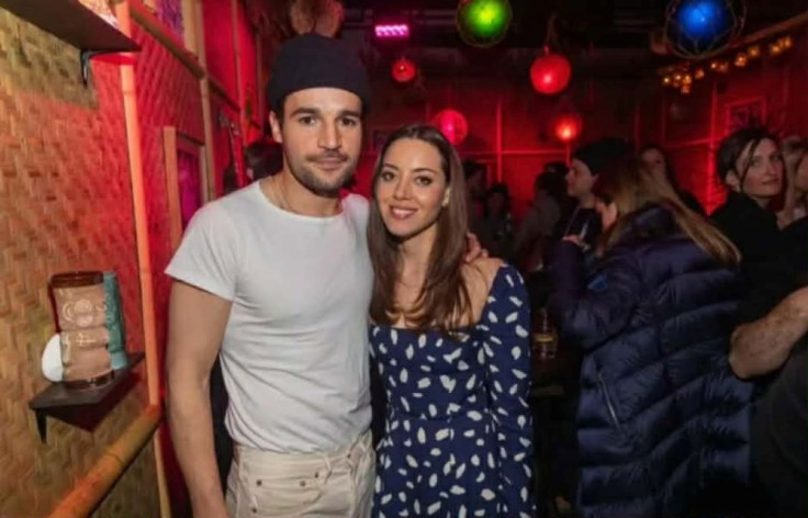 Audrey Plaza and Chris Abbott