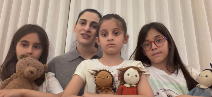 Zeynab Javadli, with her three daughters.