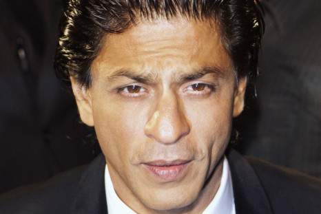 Actor Khan of India arrives on the red carpet for the premiere of "Ra One" in Toronto