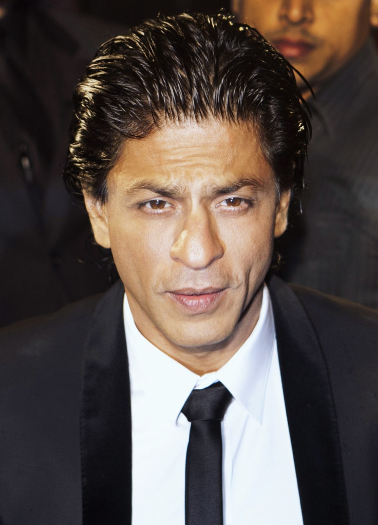 Actor Khan of India arrives on the red carpet for the premiere of &quot;Ra One&quot; in Toronto