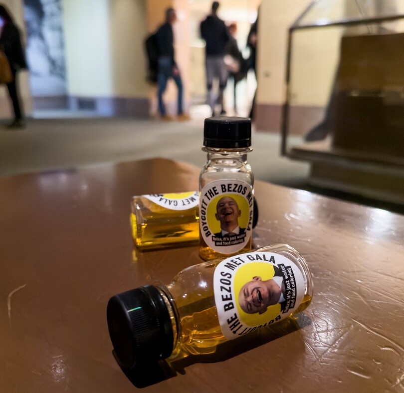 Activists Protest Jeff Bezos at 2026 Met Gala with Symbolic 'Urine' Bottles