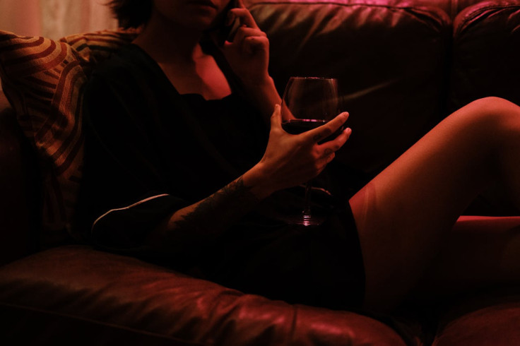 Woman lounging on a sofa