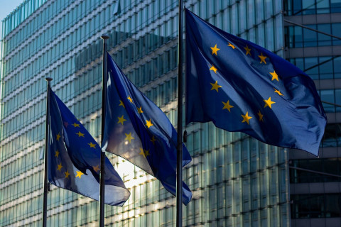 European Union flags outside the European Commission building in Brussels