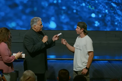 Pastor forcing teen to eat a Bible page