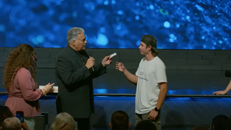 Pastor forcing teen to eat a Bible page