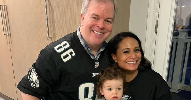 Kristen Welker and John Hughes with their child