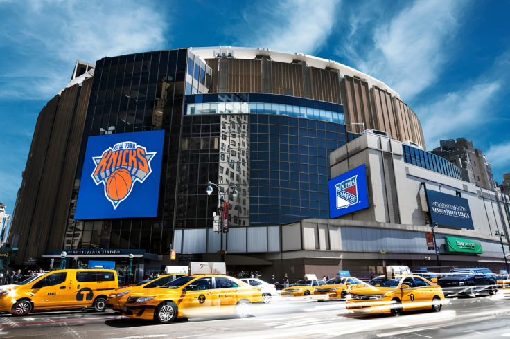 Law enforcement and emergency vehicles gather outside Penn Station after