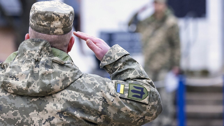 Ukrainian serviceman saluting in the UK