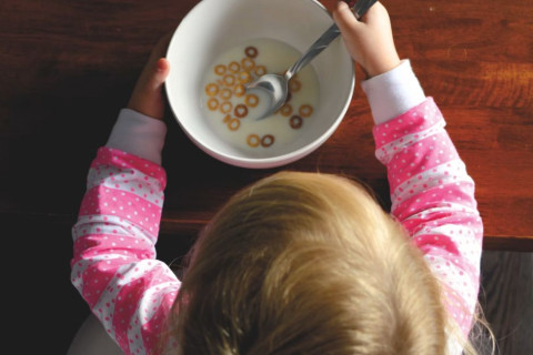 Baby Holding Food