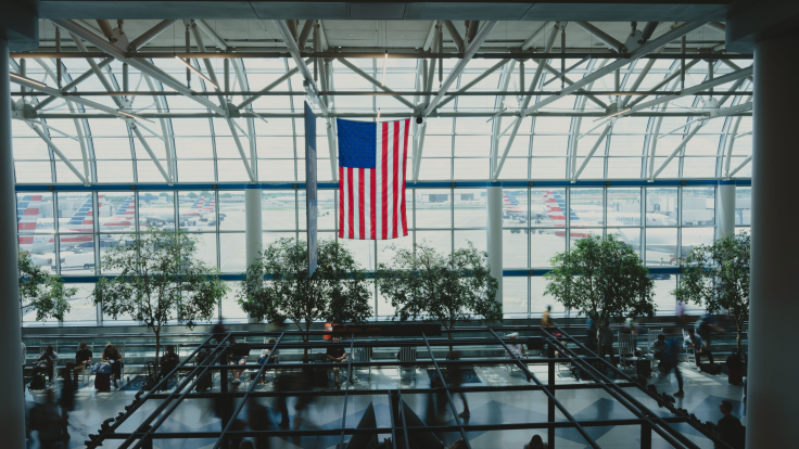 American flag in the middle of an airport