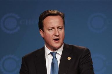David Cameron has slammed a plan to pay hefty bonuses to RBS executives