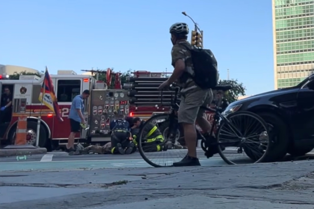 Fire police looking down at his remains