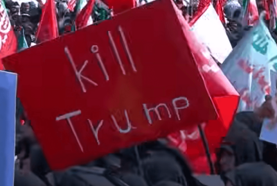 REVENGE PLACARDS AT AYATOLLAH FUNERAL