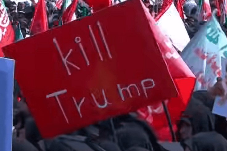REVENGE PLACARDS AT AYATOLLAH FUNERAL