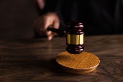 a-gavel-striking-symbolizing-justice-in-courtroom