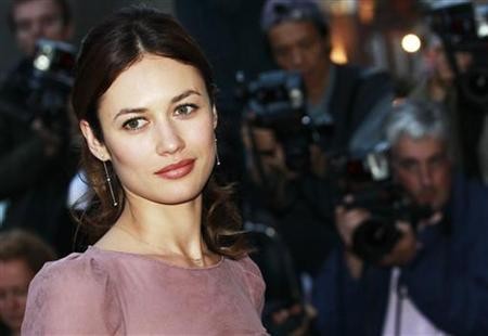 Ukrainian actress Olga Kurylenko arrives for the GQ Men of the Year 2010 Awards at the Royal Opera House in London