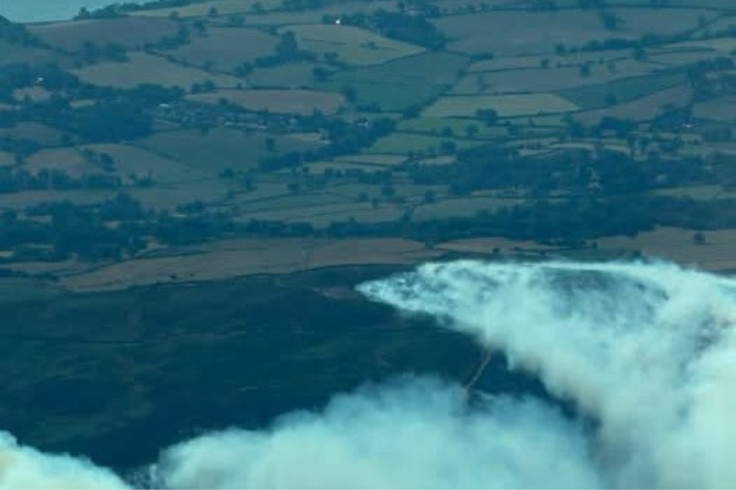 wildfire creeping into the mountains