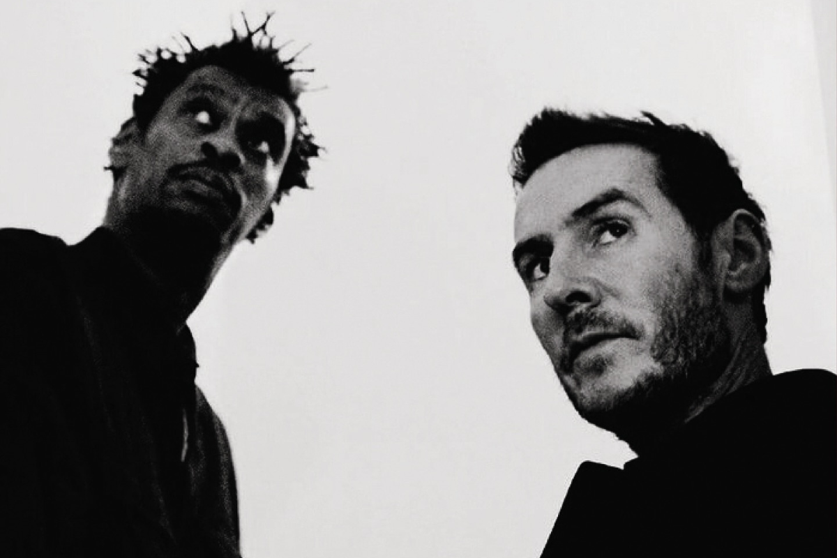 Passports Confiscated': Massive Attack Detained and Banned From Singapore Over Palestine Flag