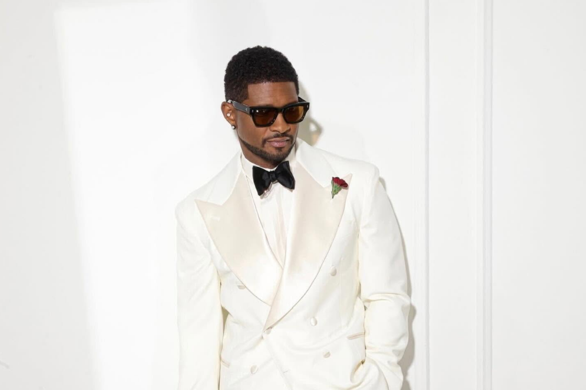 Usher Faces Backlash Over Door Gesture