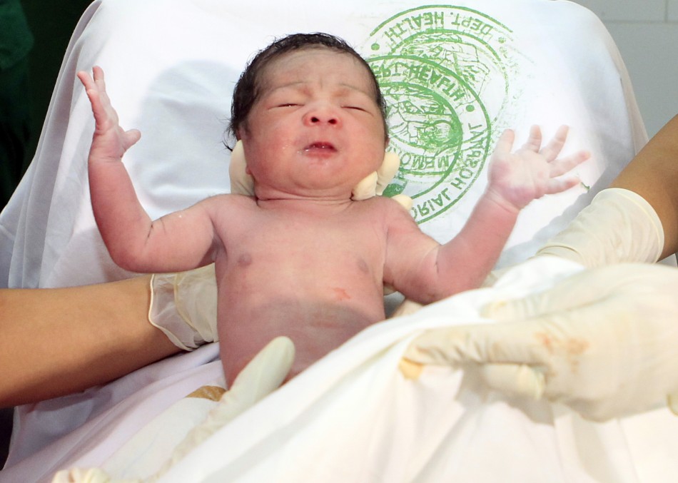 The Seven Billionth Baby Welcome to This Planet PHOTOS