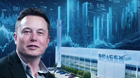 Elon Musk in front of the SpaceX factory building