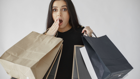Woman shocked with shopping haul