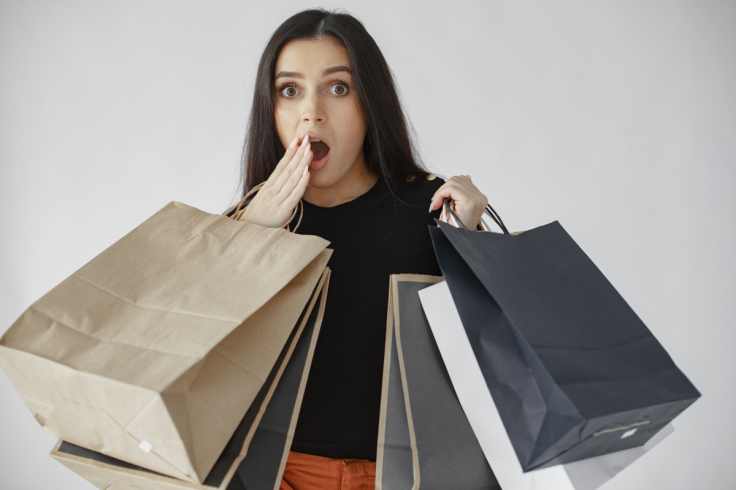 Woman shocked with shopping haul