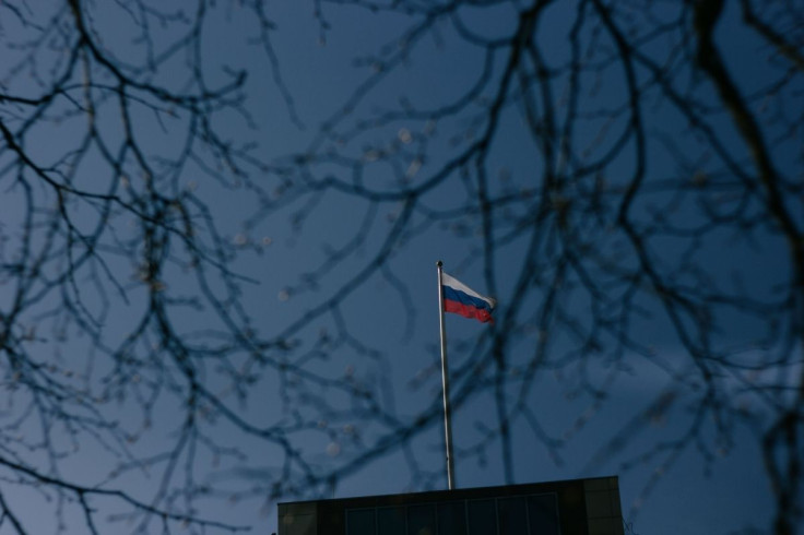Russian-flag-sorrounded-by-branches