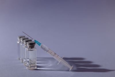 Vaccine vials and syringe