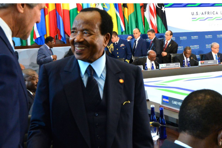 Cameroon president Paul Biya wearing a suit.