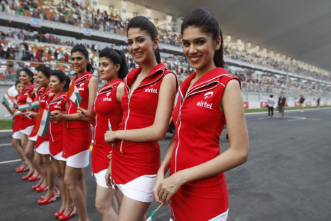 F1 Grid girls pose before the Indian first Formula One Grand Prix at the Buddh International Circuit in Greater Noida
