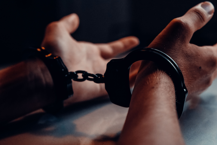 Representative Image of Man in Handcuffs