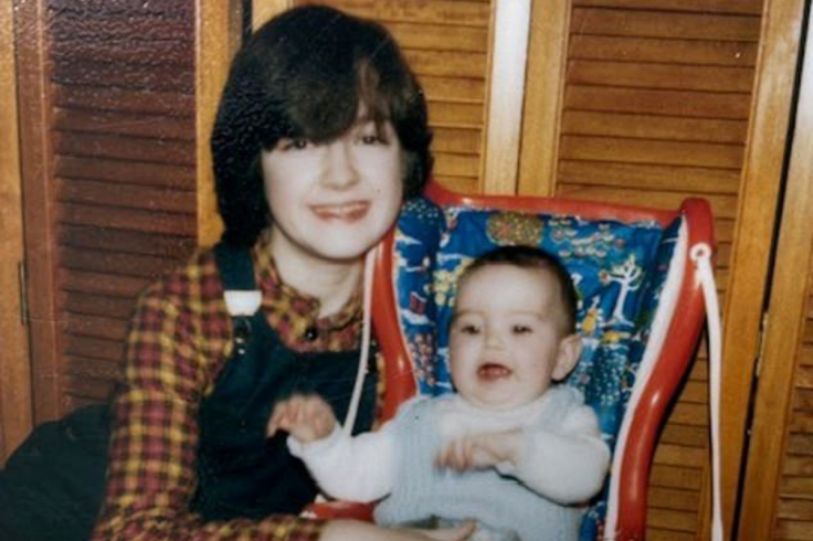Julia Macklin, aged 14, with her baby brother.